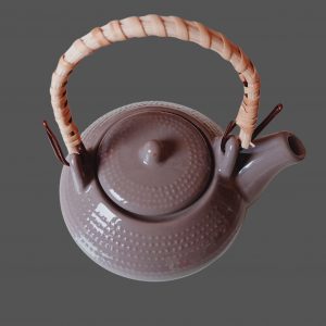 Théière en grès neuve, design épuré et naturel, parfaite pour des moments de détente.